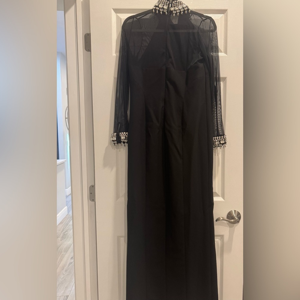 Cinq à Sept Elegant Black Dress with Pearl Cuff Accents